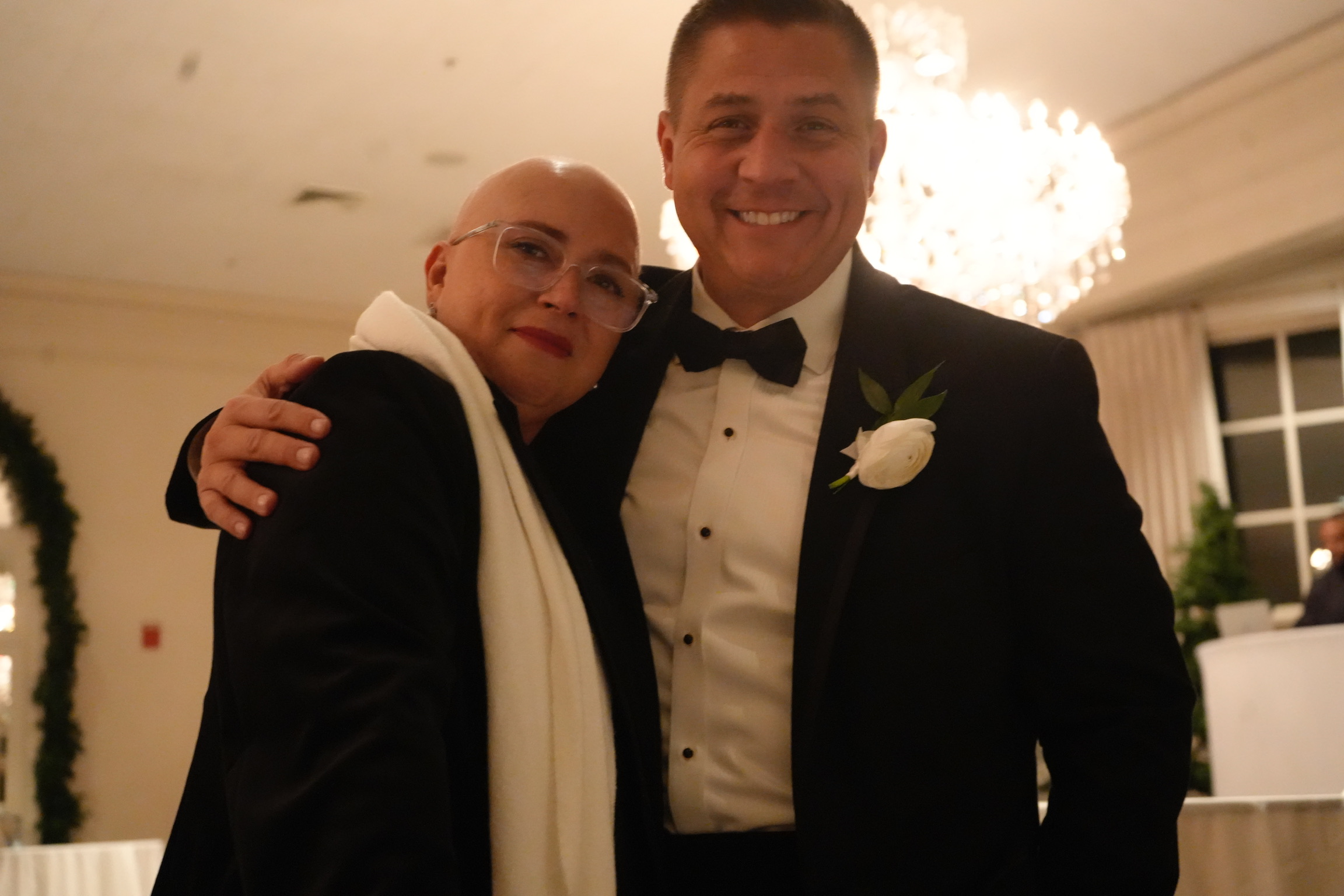 Margarita and her brother Juan together at a celebration